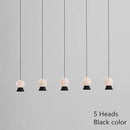 Suspension et lustre design à LED avec boule en verre et support dorée