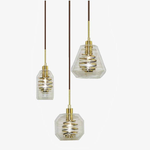 Suspension design en verre avec spirale dorée